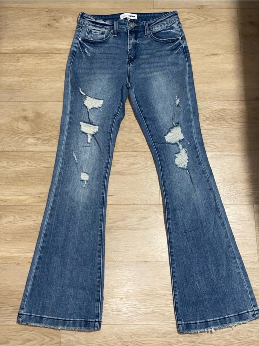 Fashion Nova Distressed Flare Jeans in Medium Wash Blue
